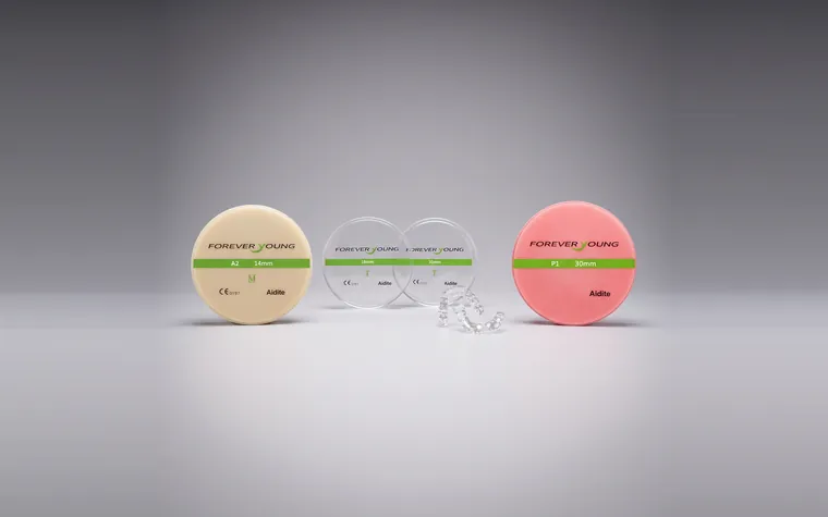 Discos de PMMA Aidite — multicamadas, transparente e gengiva